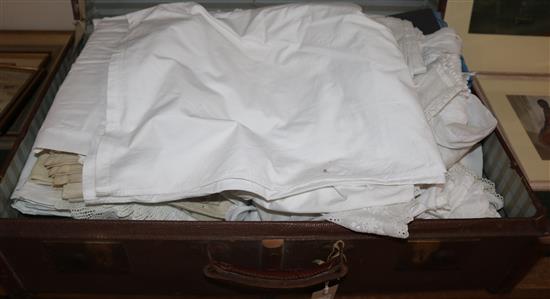 A quantity of lace and linen, childrens embroidered boleros, gowns and blouses, etc contained in a bentwood and canvas steamer trunk